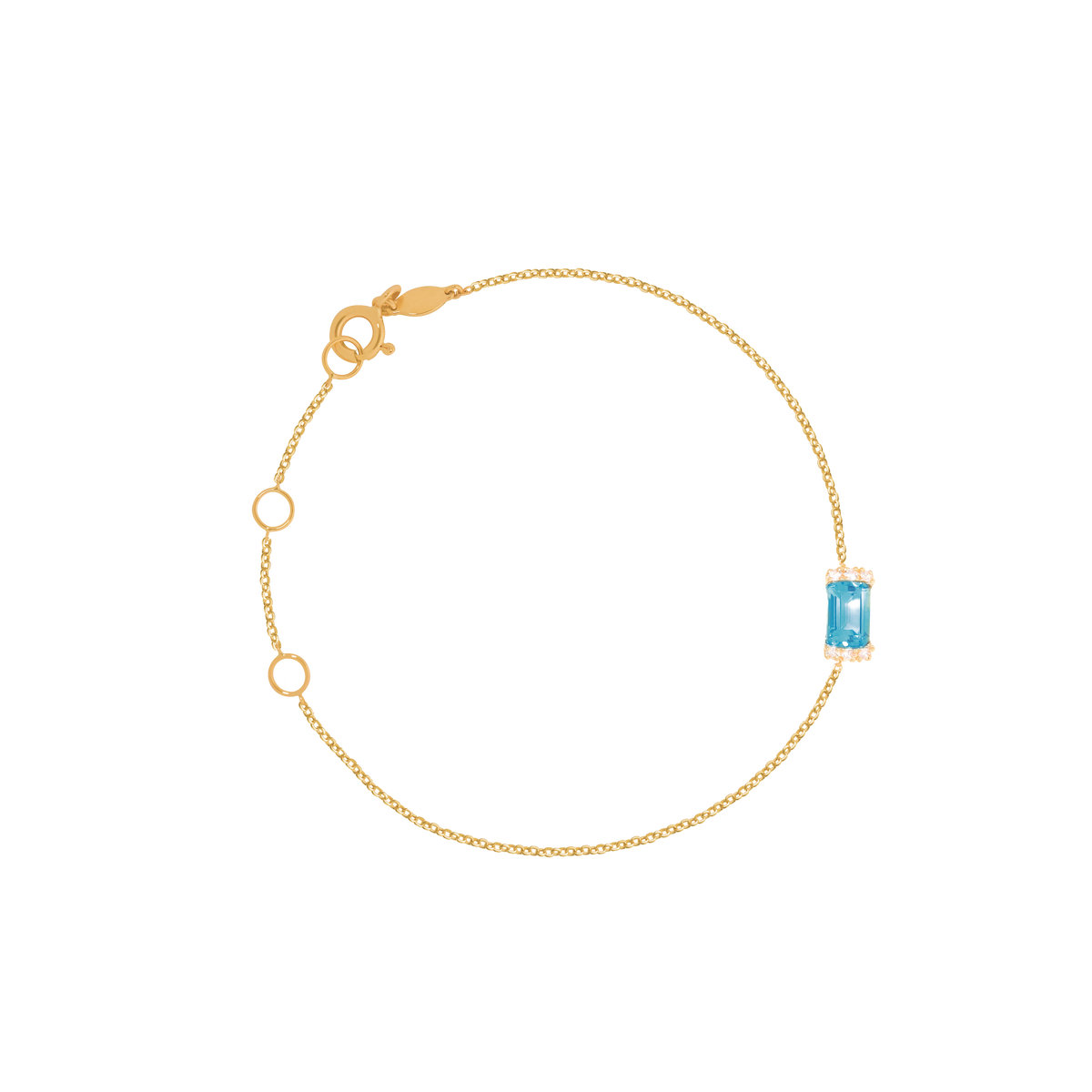 Pulsera Amelia en oro amarillo de 18K con topacio azul corte esmeralda