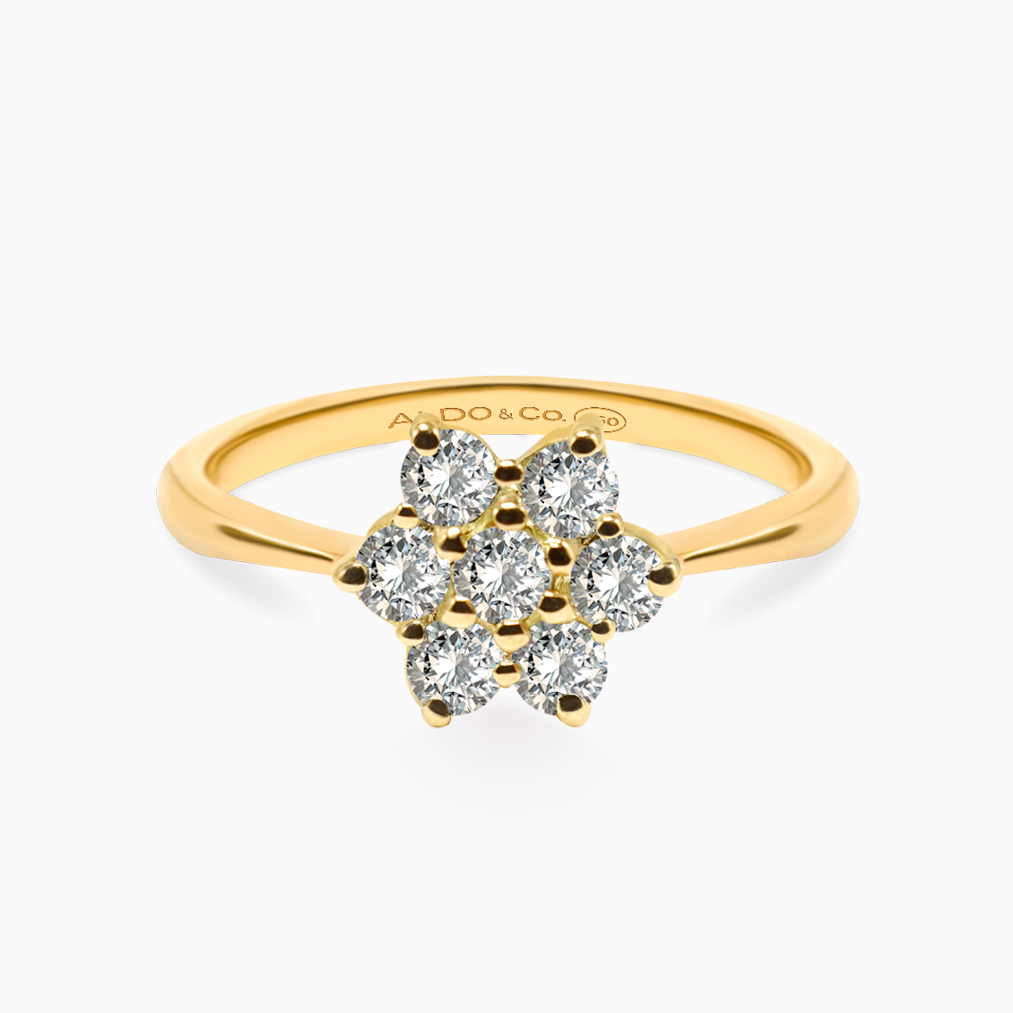 Anillo roseta estrella en oro amarillo de 18K con brillantes