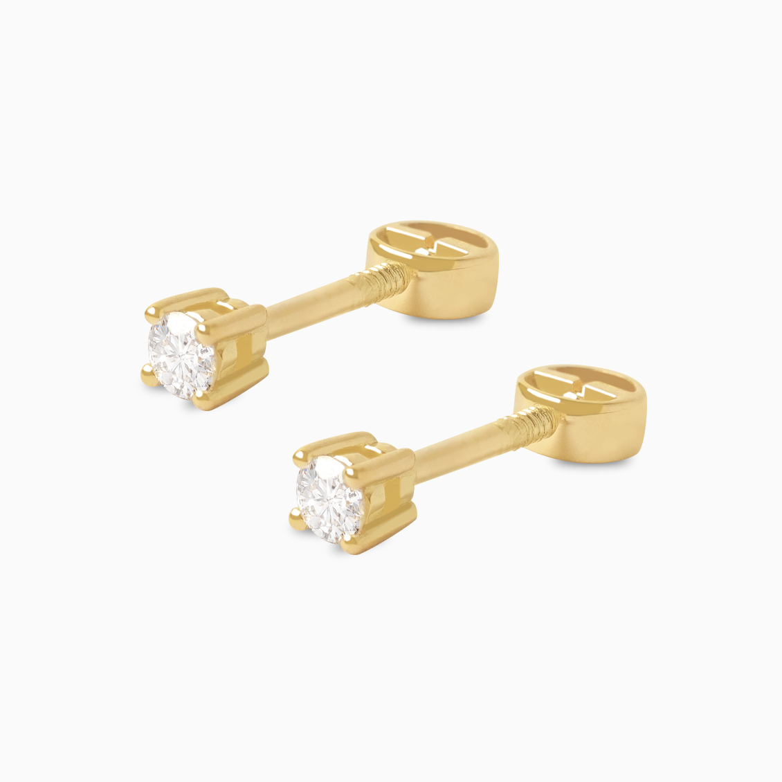 Aretes en oro amarillo de 18K punto de luz con brillante