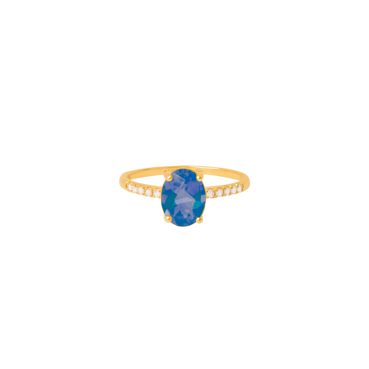 Anillo oro amarillo de 18K con topacio azul london blue oval