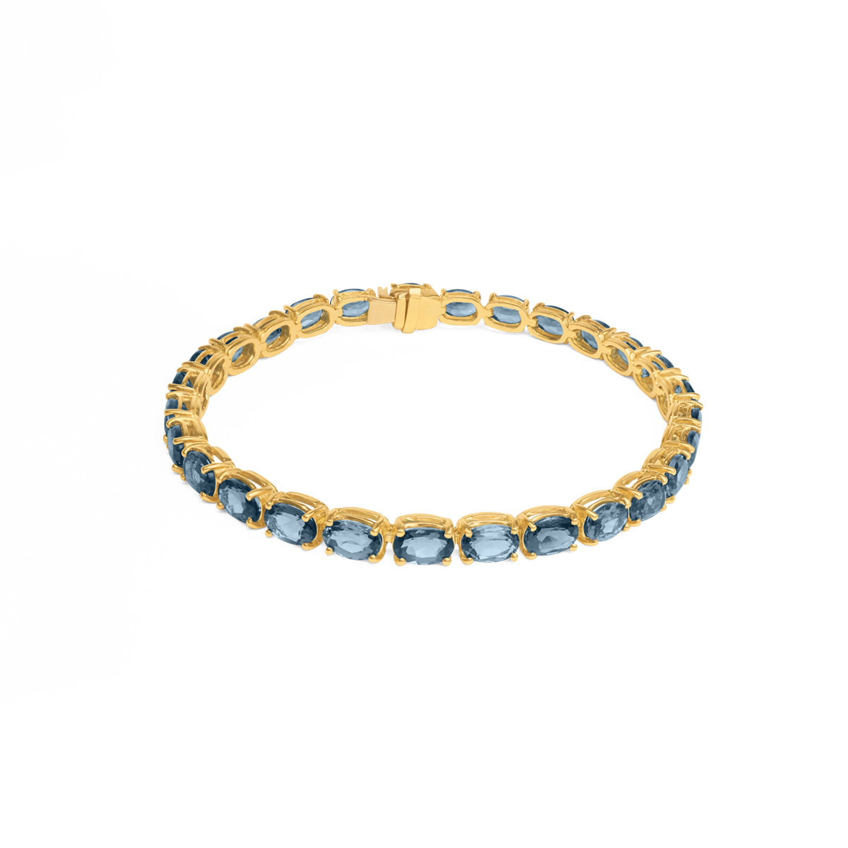 Pulsera oro amarillo de 18k tennis con topacio london blue