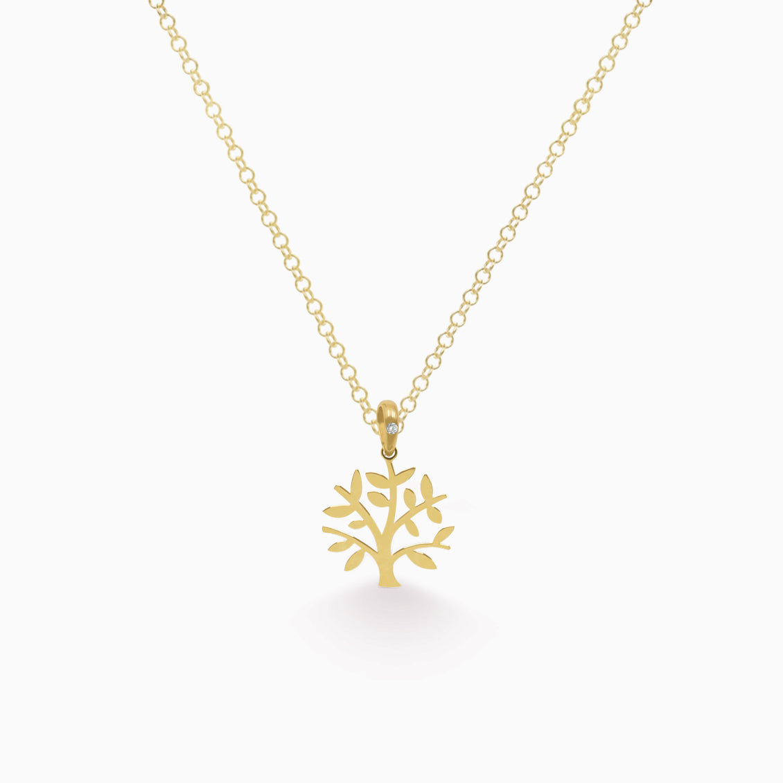 Dije en oro amarillo de 18K árbol con brillante