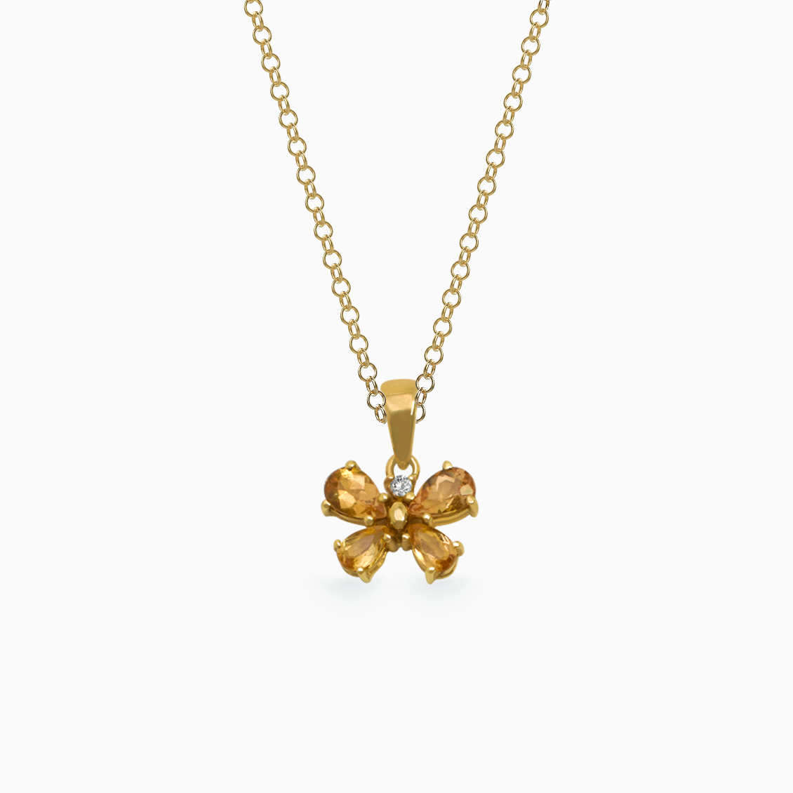 Dije en oro amarillo de 18K mariposa con topacios imperiales